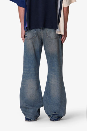 Distressed Kick Flare Denim - Washed Blue